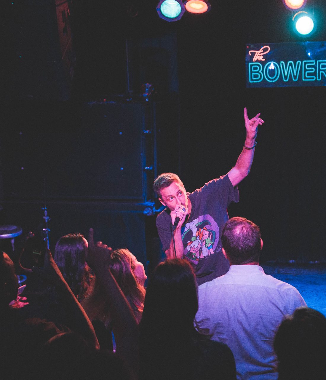 Tyler performing live, pointing to the crowd